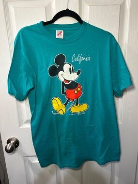Vintage Disney Jerzees Teal Mickey Mouse Graphic Tee with Red and Yellow Accents